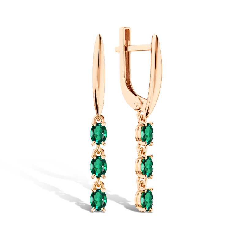 Золотые серьги с изумрудами