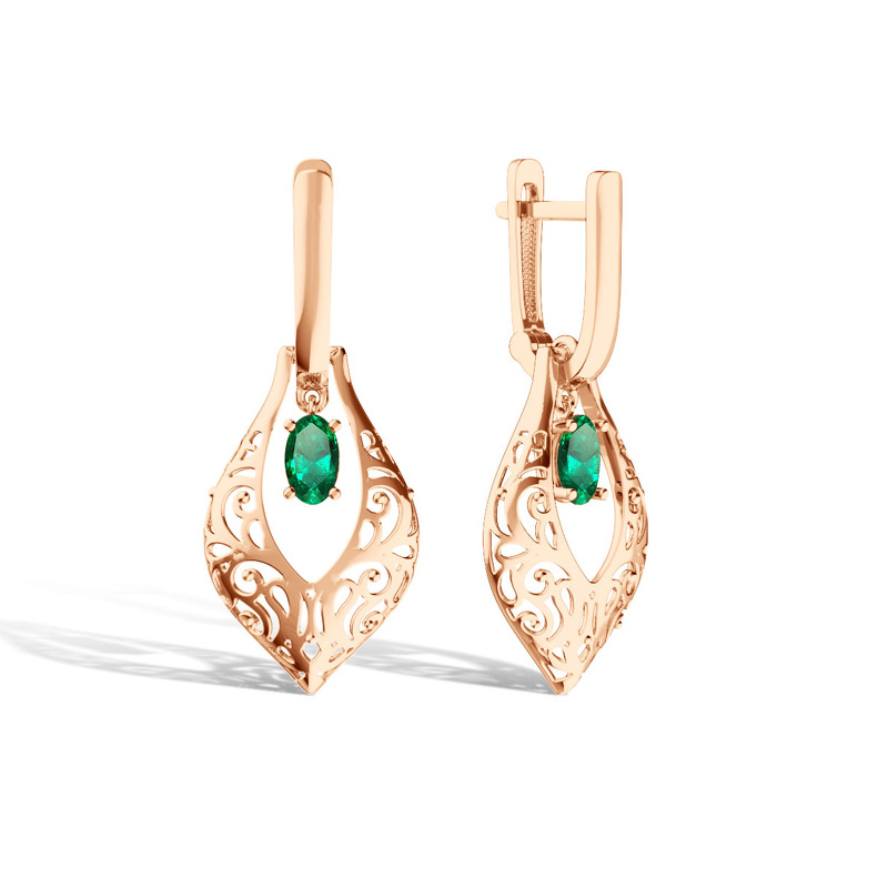 Золотые серьги с изумрудом