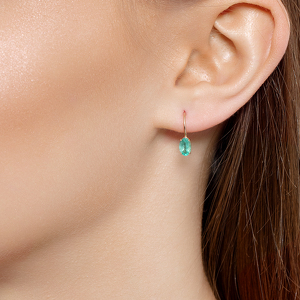 Золотые серьги с изумрудом