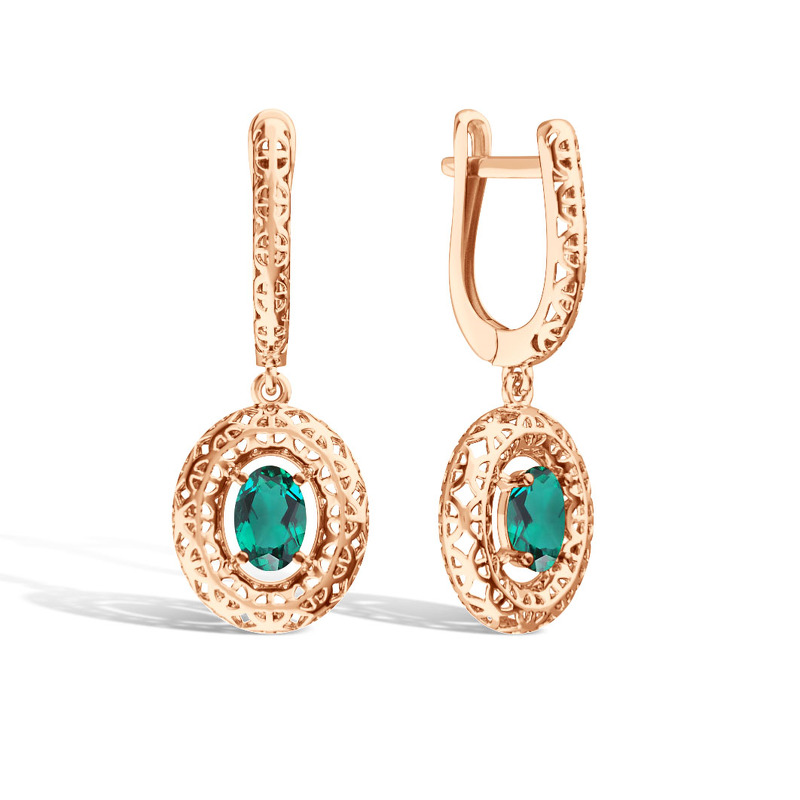 Золотые серьги с изумрудом