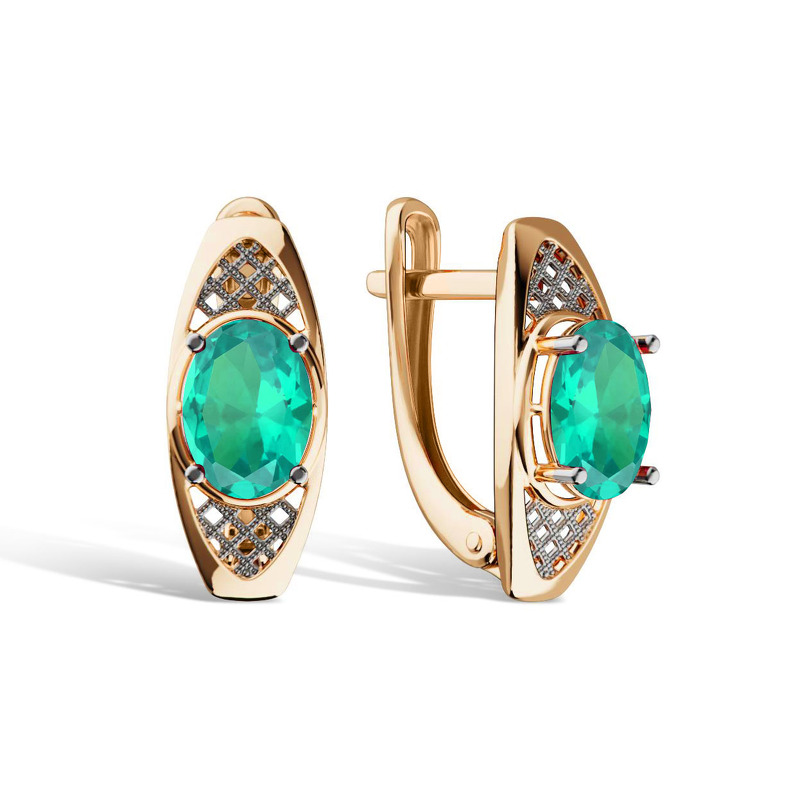 Золотые серьги с изумрудом