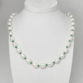 Жемчуг 608 бусы жемчуг белый рис 10х8мм Индонезия