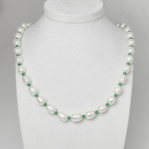 Жемчуг 608 бусы жемчуг белый рис 10х8мм Индонезия